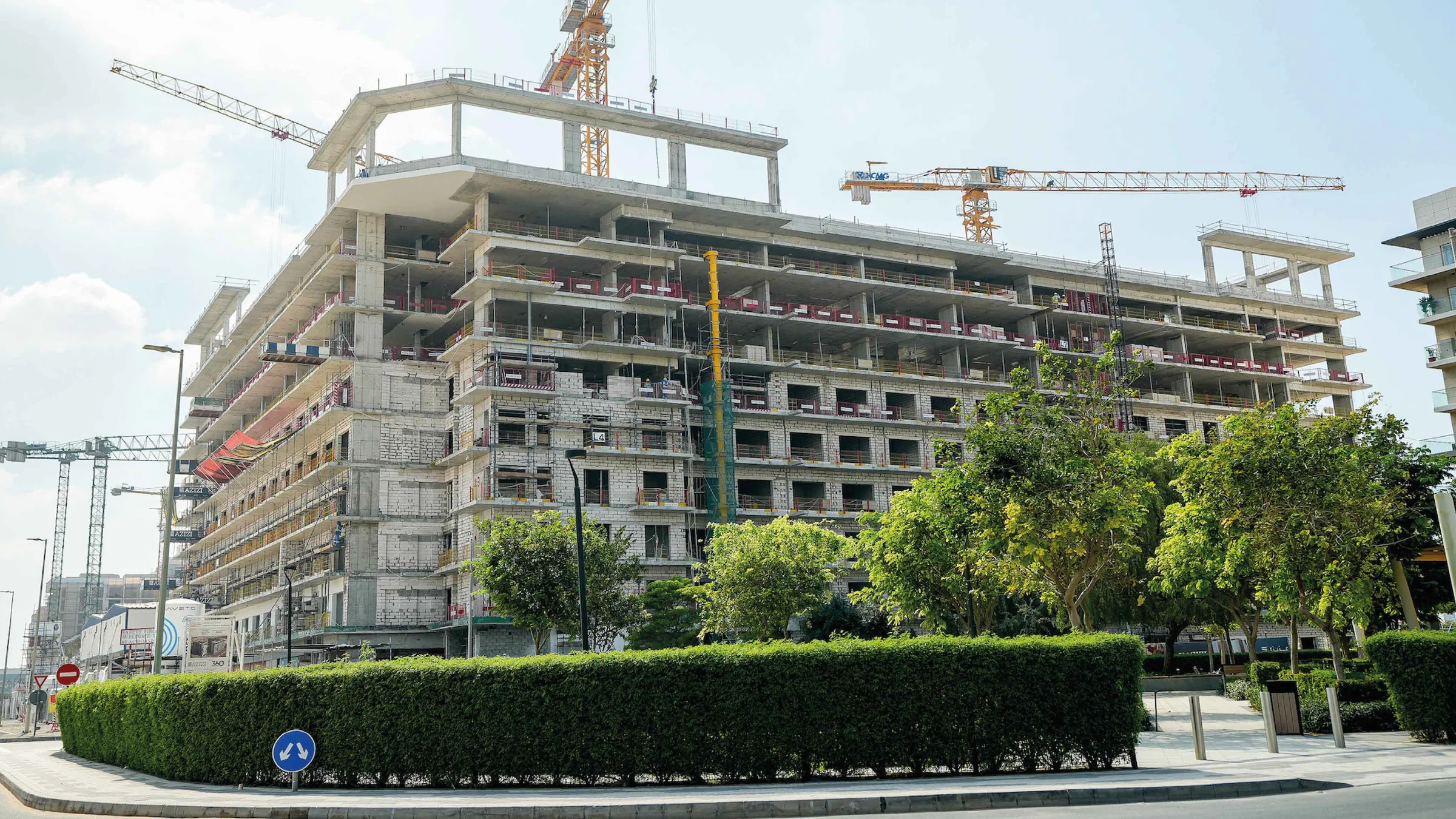 Structure 99% complete in April 2026