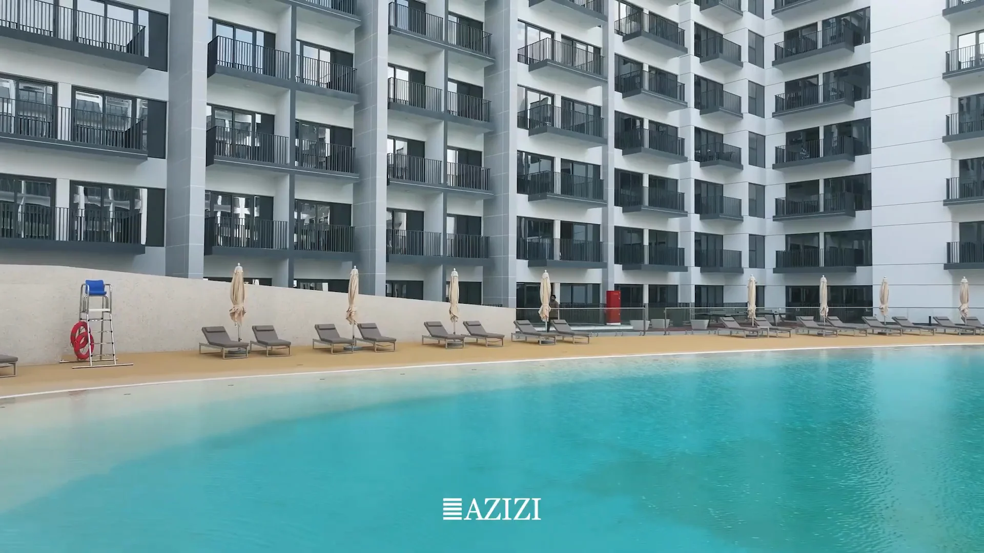 A beach-like pool at the heart of the courtyard