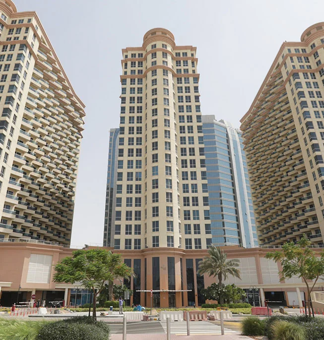 Three towers around a central portico