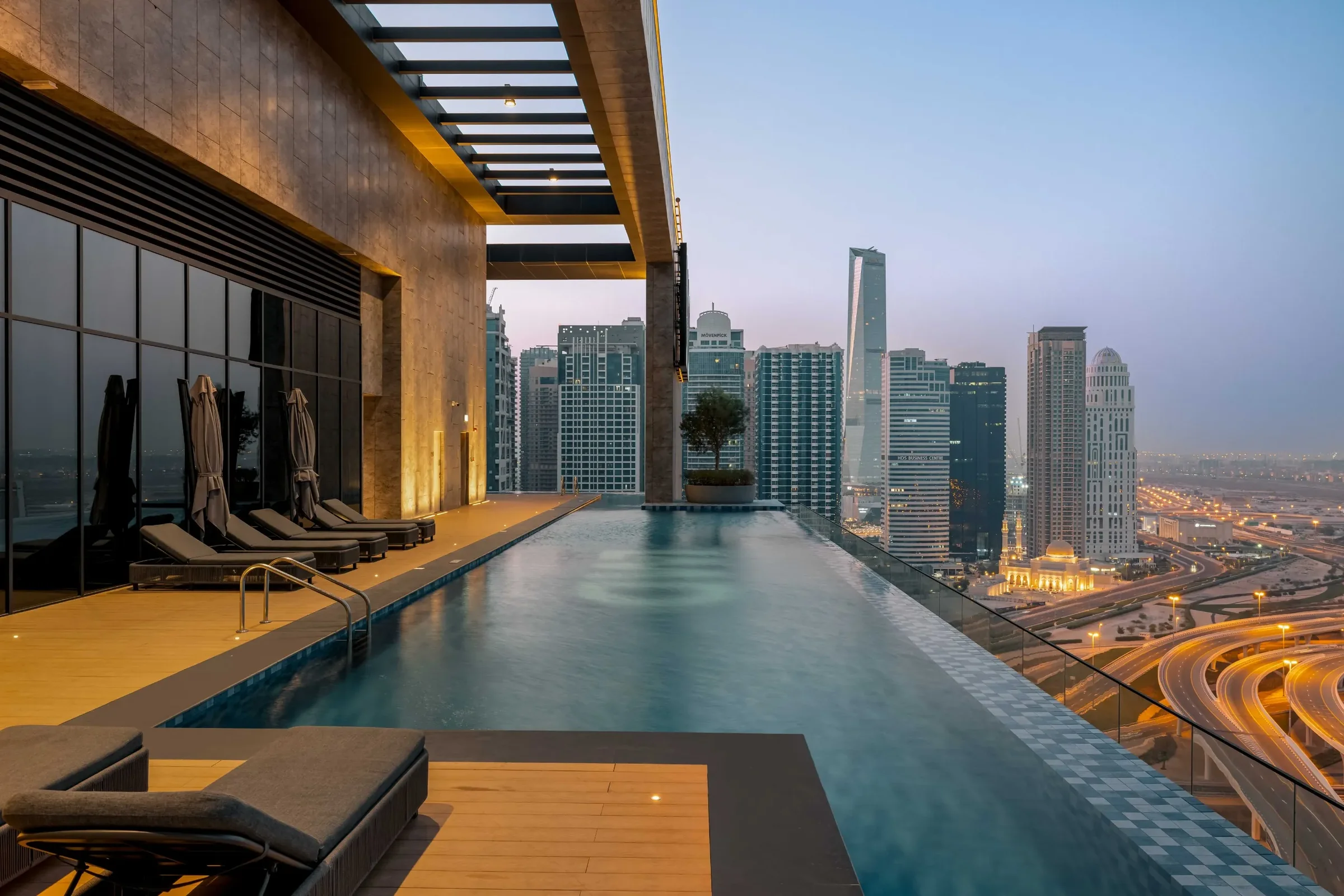 Infinity pool over the marina skyline