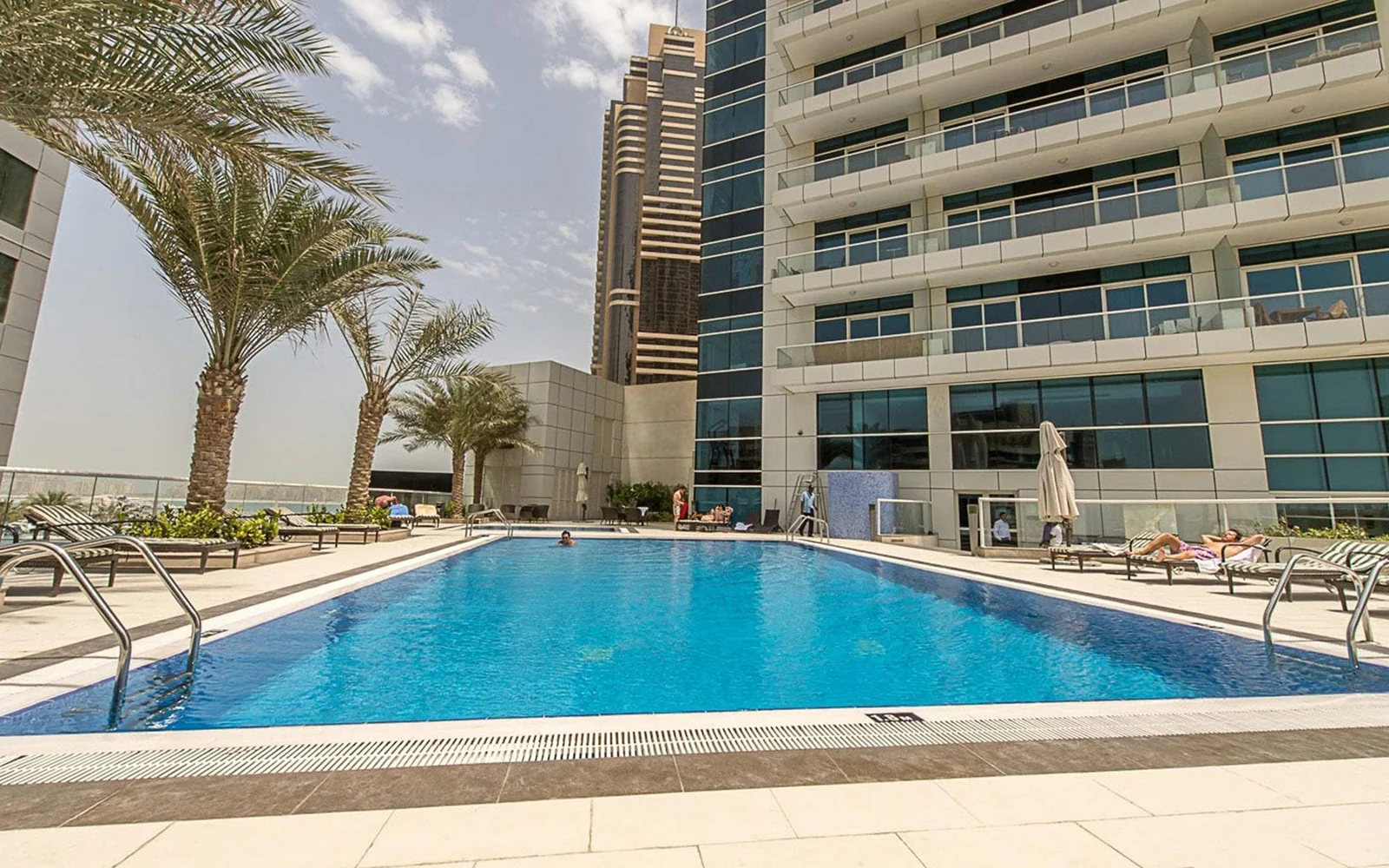 A tropical-themed pool deck