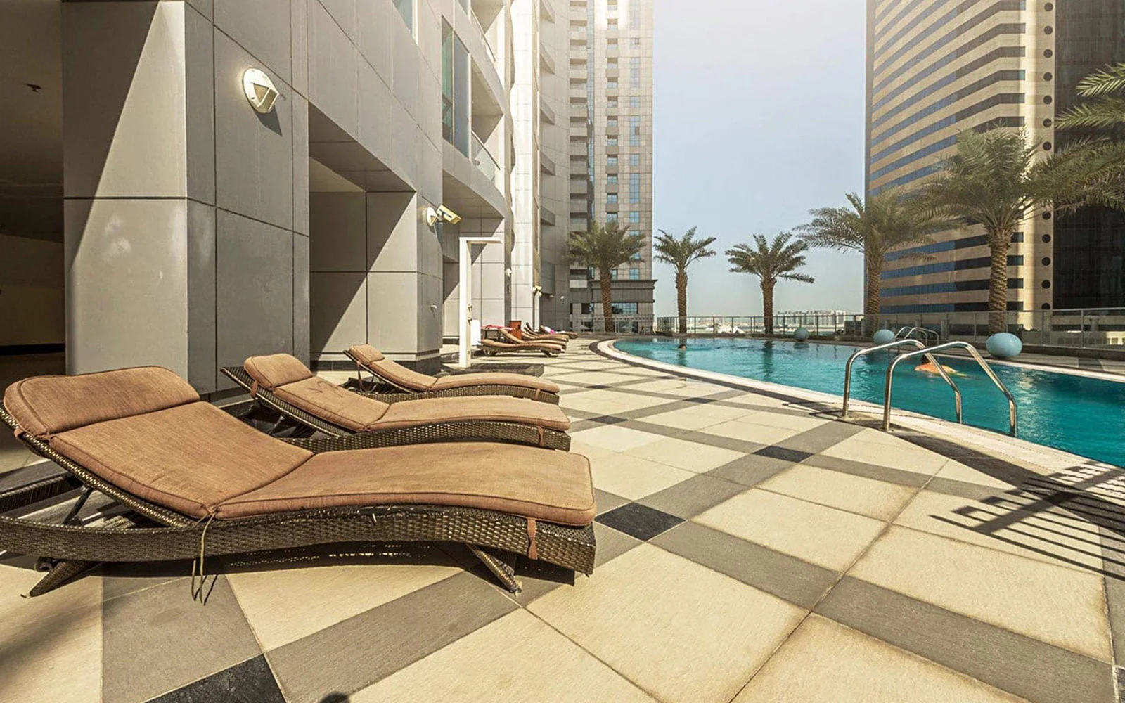 A pool on a large private deck